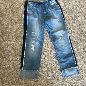 Jeans with small hole in side that needs sowed up